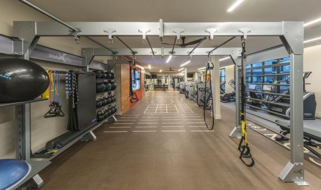 Quick access to state-of-the-art amenities a gym with exercise equipment
